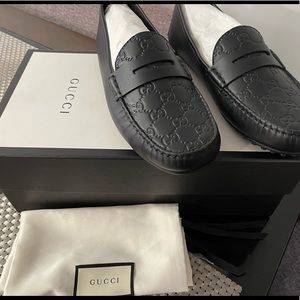 Authentic Mens Gucci loafers!  Brand new!  Never worn!  Size 9 1/2.  Nice!
